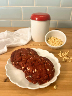 Red velvet New York cookies with white chocolate chips on a plate